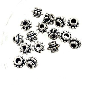 8 Sterling Silver Bali Beads. Sv14